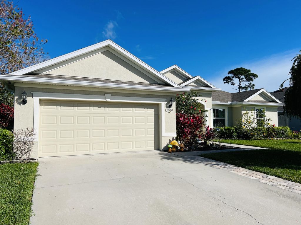 Photo of 1581 SW Birkey Avenue, Port Saint Lucie, FL 34953 (MLS # R10957643)