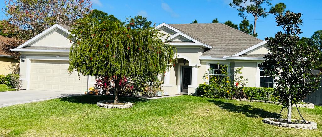 Photo of 1581 SW Birkey Avenue, Port Saint Lucie, FL 34953 (MLS # R10957643)