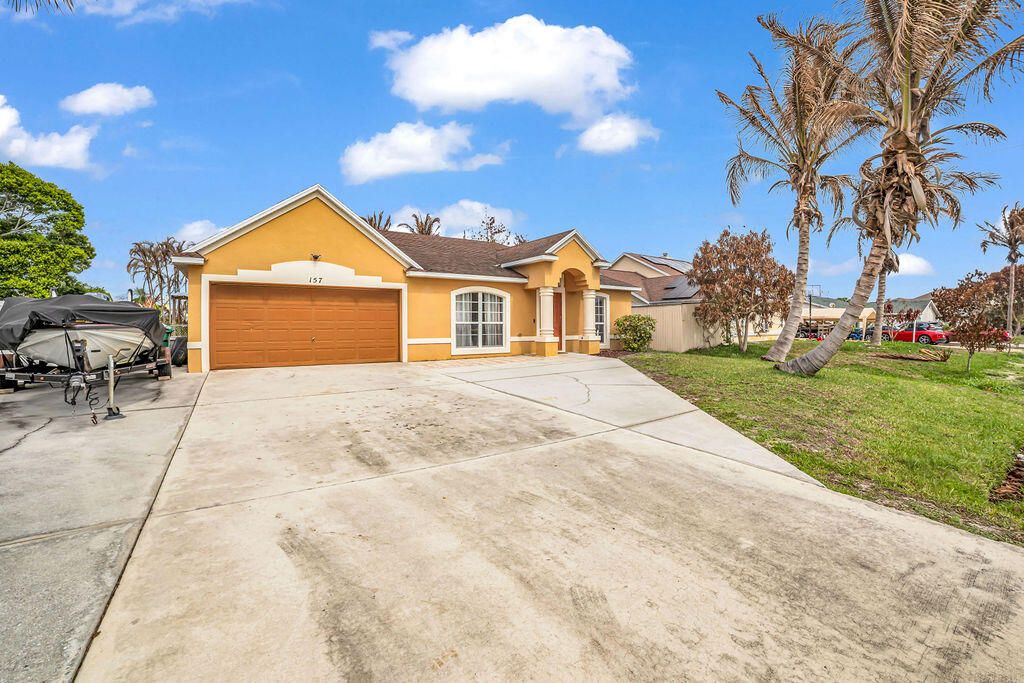 Photo of 157 NE Jettie Terrace, Port Saint Lucie, FL 34983 (MLS # B26005443)