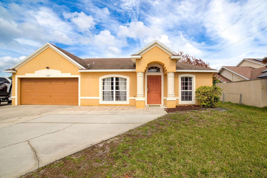 Photo of 157 NE Jettie Terrace, Port Saint Lucie, FL 34983 (MLS # B26005443)