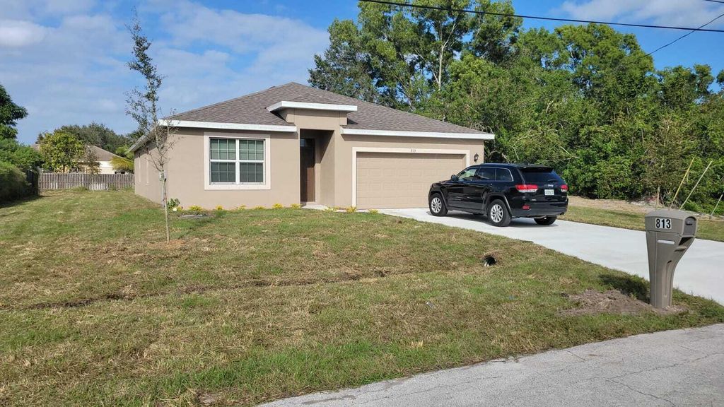 Photo of 813 SW Mccoy Avenue, Port St Lucie, FL 34953 (MLS # R10908794)