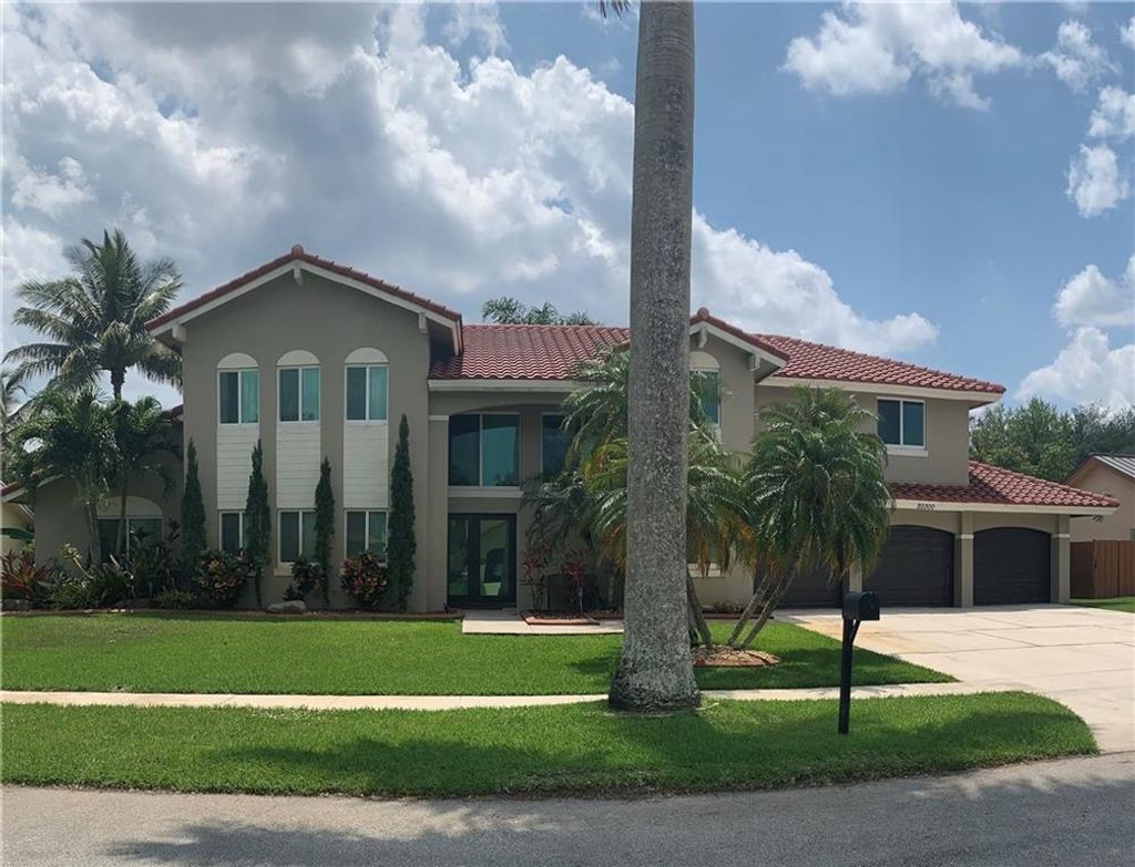 Photo of 20300 NW 2nd St, Pembroke Pines, FL 33029 (MLS # F10281499)