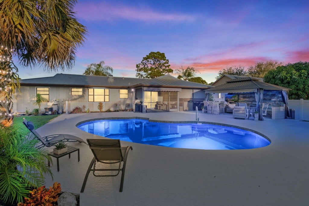 Photo of 1658 SW Gemini Lane, Port Saint Lucie, FL 34984 (MLS # R11142890)