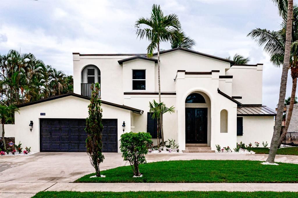 Photo of 716 Kittyhawk Way, North Palm Beach, FL 33408 (MLS # R10725193)