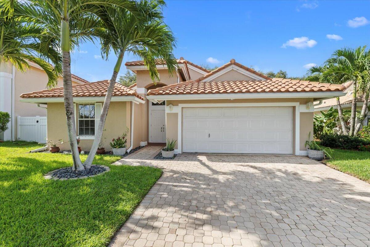 Fresh, bright, and move-in ready in a gated community--just minutes from A-rated Citrus Cove Elementary. Thoughtful 2007 remodel features a chef's kitchen with stainless steel appliances, granite counters, and solid wood cabinetry. Spacious living/dining/family rooms with vaulted ceilings. 3 bedrooms with a bonus 4th room / den. Diagonal 20x20 tile flooring in main areas; laminate in the primary and 2nd bedroom for comfort. Primary suite offers a large walk-in closet and a spa tub/shower combo. Additional perks: hurricane shutters throughout and central A/C. Convenient location near shopping, dining, parks, and commuter routes. Well-kept home in a quiet, secure setting--easy to love and easy to live in.