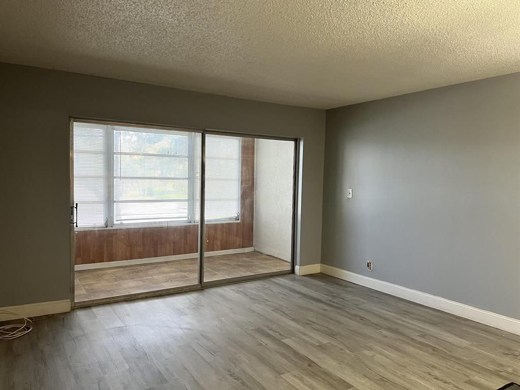 Photo of 8810 W Mcnab Road, Tamarac, FL 33321 (MLS # B26017968)