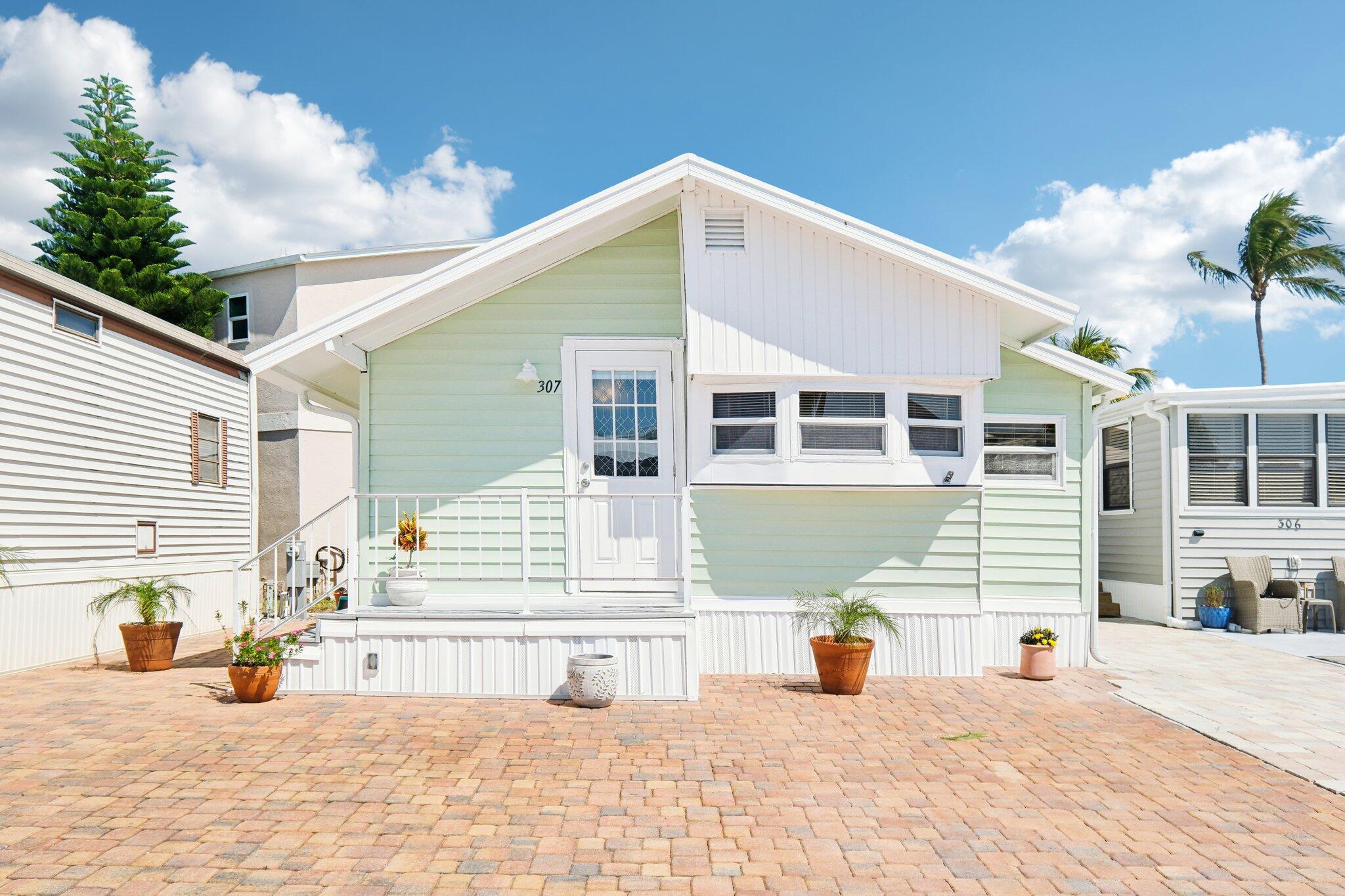 Welcome Home to this cozy 2-bedroom, 1 bathroom home on Nettles Island featuring a newer roof (2021) AC (2019) and plenty of room to accommodate 2 cars and a golf cart! This coastal retreat offers the Ultimate Island Lifestyle with access to 2 pools, tennis courts, pickleball, shuffleboard, mini golf, a fitness center, beach access, on site dining, social events, and more adding exceptional charm to this hidden gem.Don't miss your chance to own a piece of paradise. Schedule your tour today!