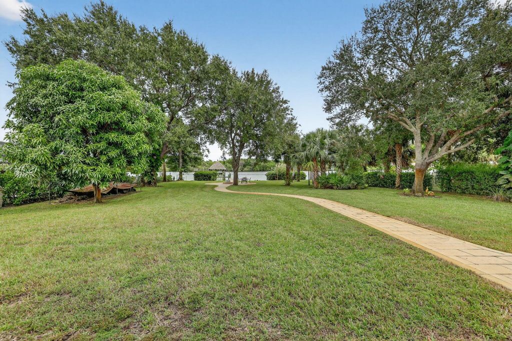 Photo of 3241 SE South Lookout Boulevard, Port Saint Lucie, FL 34984 (MLS # R11138835)