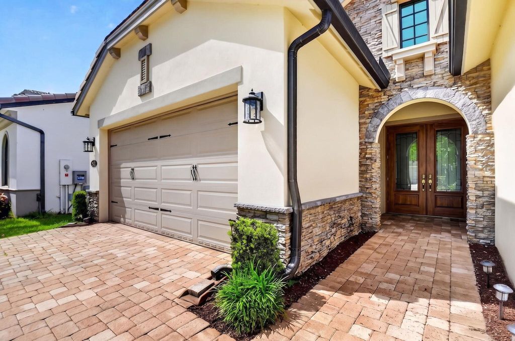 Photo of 8524 Grand Prix Lane, Boynton Beach, FL 33472 (MLS # B26021201)