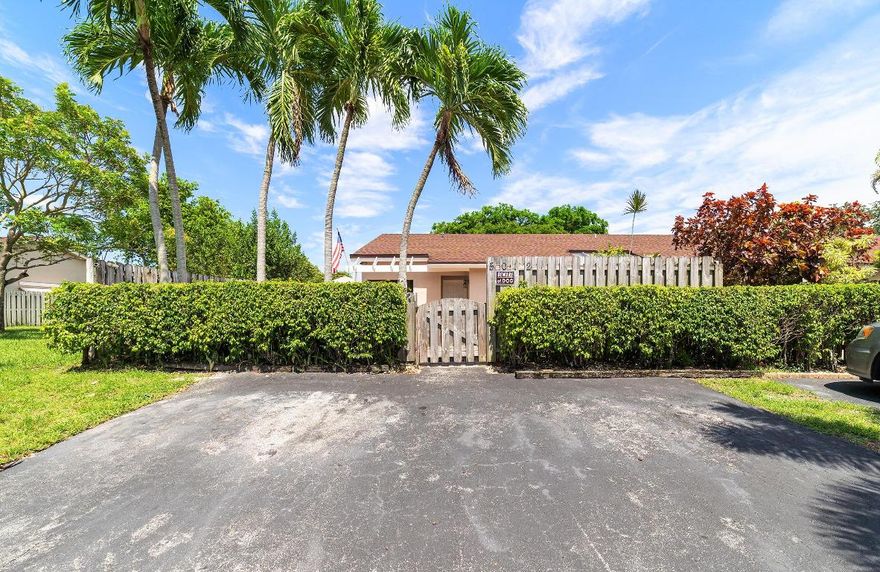 COMPLETELY REMODELED END UNIT VILLA.  This spacious end unit villa in the Lakes has been completely remodeled.  Inside you will find: 2 master bedrooms; vaulted ceilings; a gourmet kitchen complete with new cabinets, granite counter tops and stainless steel appliances; new light fixtures and fans; tile floors throughout; fully remodeled bathrooms with frameless glass shower doors, high-end fixtures and new modern vanities; freshly painted inside and out; and new moldings and doors throughout.  This end unit also boasts: parking for three cars; huge front paved patio; paver side and back yard; fenced and private with no rear neighbors.  This is a premium property that surely won't last.