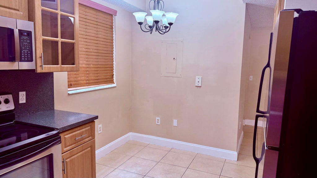 Photo of 6952 SW 39TH Street #C106, Davie, FL 33314 (MLS # B26076176)