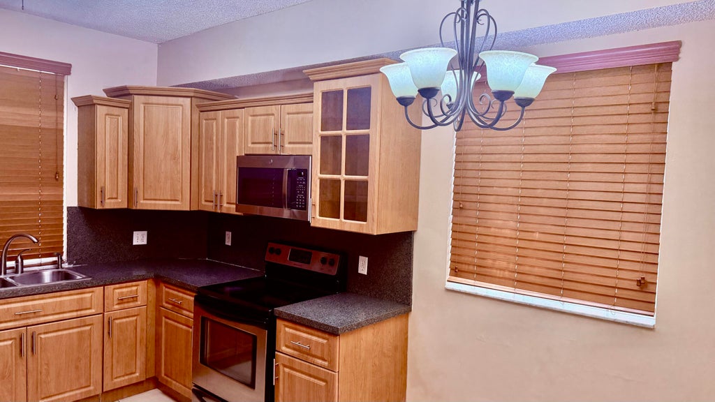 Photo of 6952 SW 39TH Street #C106, Davie, FL 33314 (MLS # B26076176)