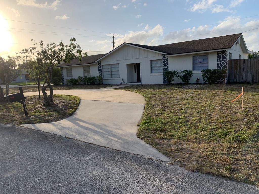 Photo of 3119 Tropical Trail, Lake Worth, FL 33462 (MLS # R10718367)