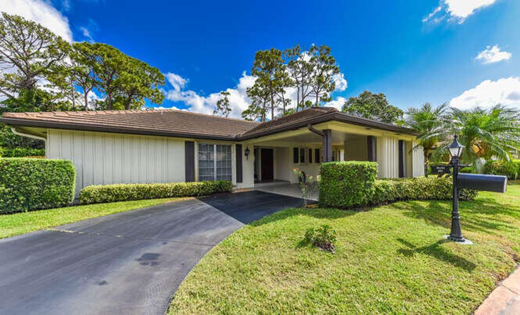 Photo of 493 Forestview Drive, Atlantis, FL 33462 (MLS # R11169527)