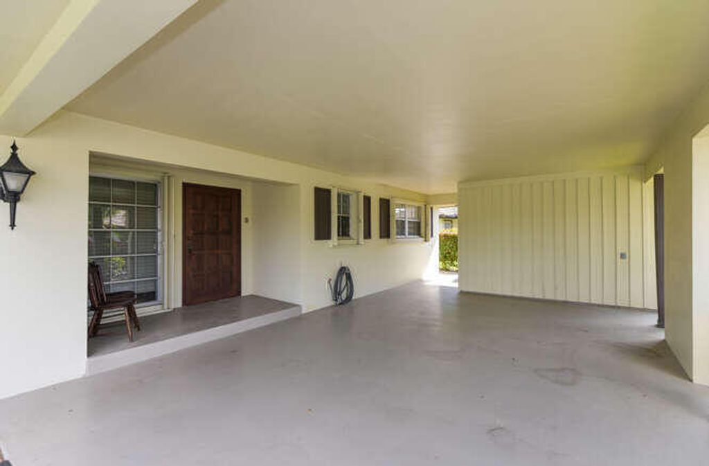 Photo of 493 Forestview Drive, Atlantis, FL 33462 (MLS # R11169527)