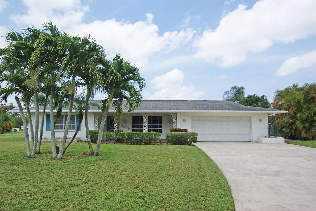 Photo of 2899 SE Ginza Street, Port St Lucie, FL 34952 (MLS # R10901141)