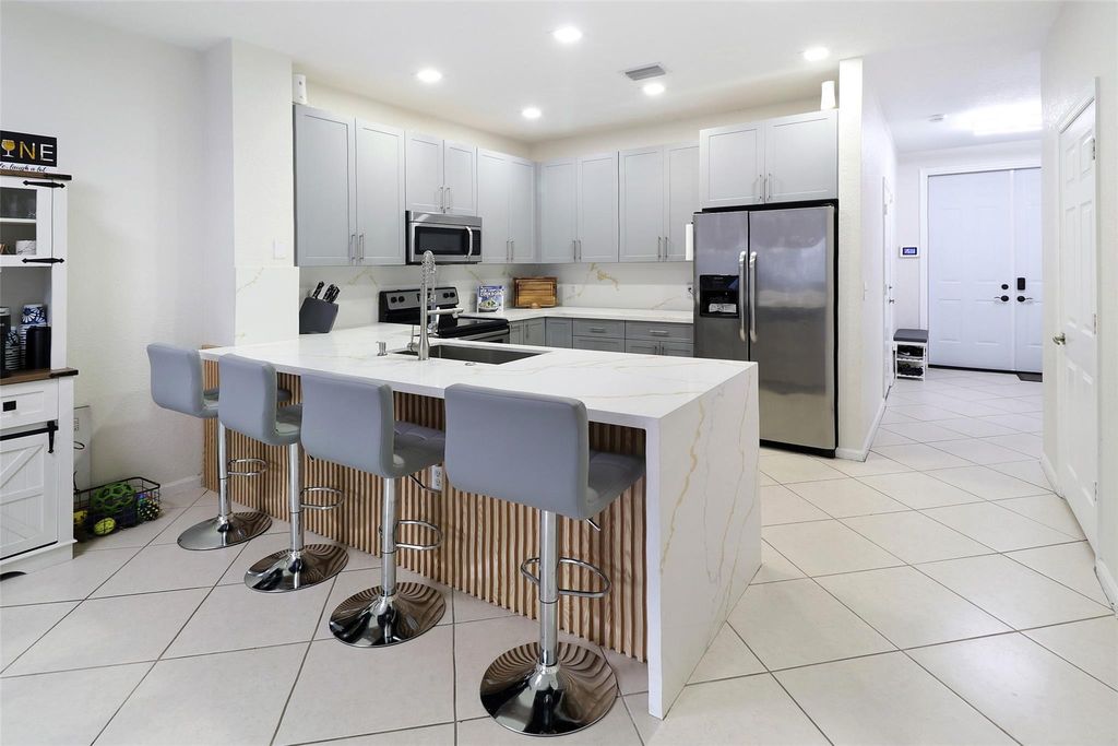 Photo of 8106 Prestige Commons Dr #8106, Tamarac, FL 33321 (MLS # F10537107)