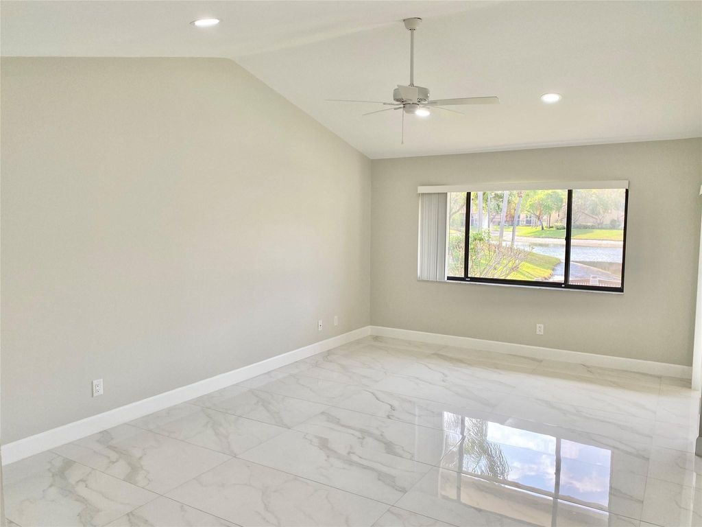 Photo of 5591 Coach House Circle #A, Boca Raton, FL 33486 (MLS # F10496574)