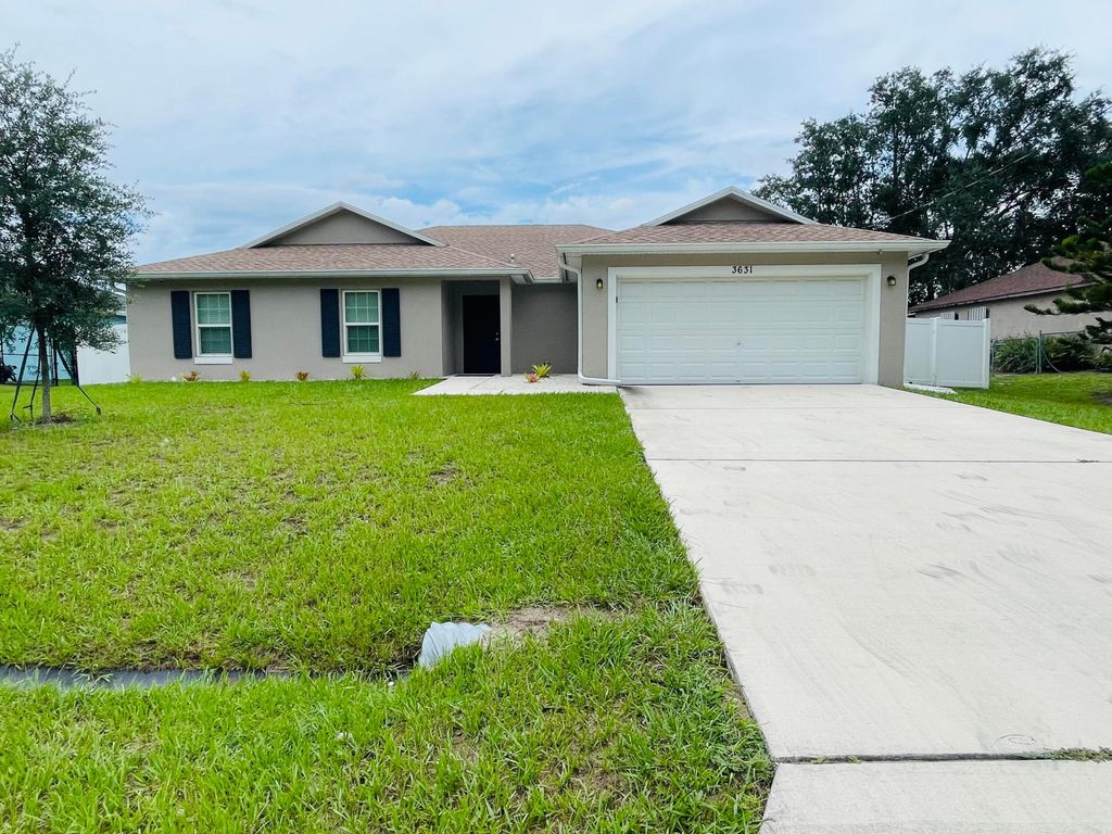 Photo of 3631 SW Kromrey Street, Port Saint Lucie, FL 34953 (MLS # B26015337)