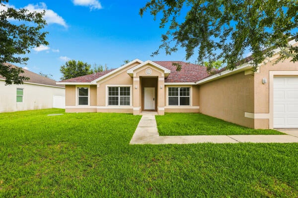 Photo of 1982 SW DIAMOND Street, Port Saint Lucie, FL 34953 (MLS # B26072352)