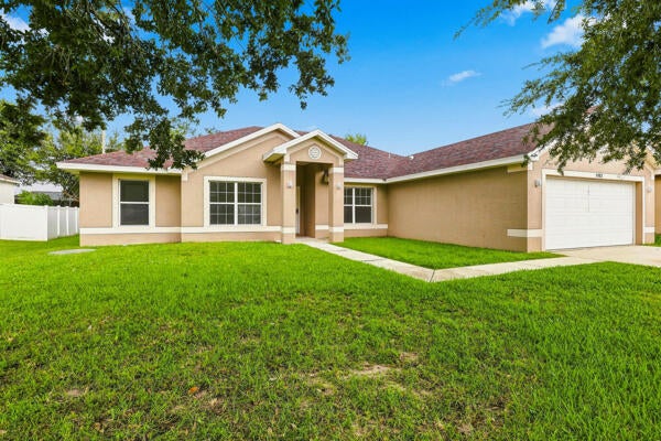 Photo of 1982 SW DIAMOND Street, Port Saint Lucie, FL 34953 (MLS # B26072352)