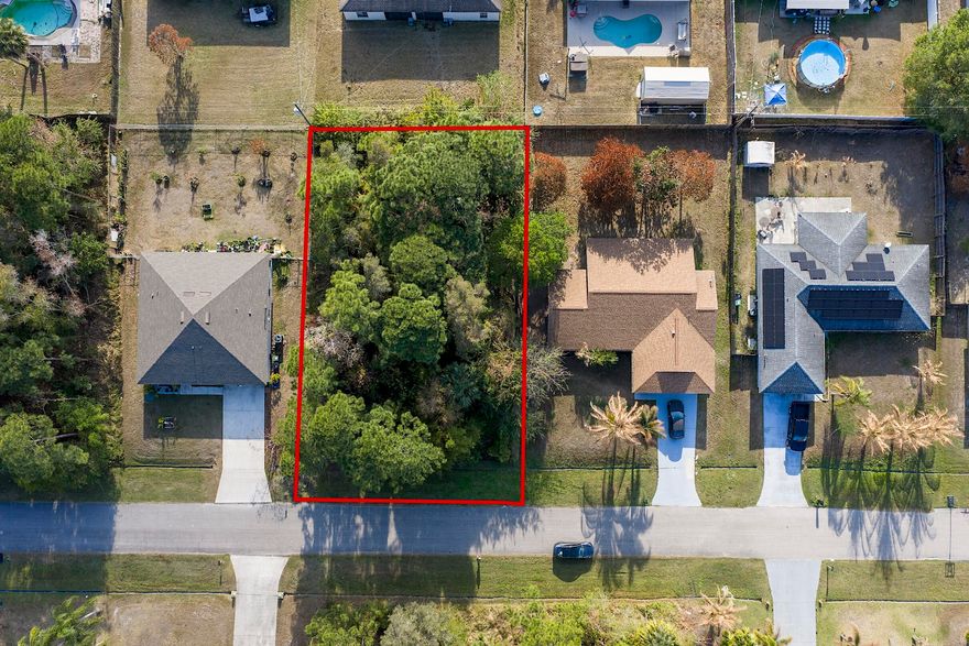 Secure your piece of Florida's thriving Treasure Coast! This beautiful 0.23-acre lot, situated in the heart of Port Saint Lucie, is the perfect location for your dream custom single-family home. Conveniently located close to Port St. Lucie Blvd and just three miles from US1, this property offers excellent access to major routes, including US1 and I-95, making commuting easy. With no HOA restrictions, this lot is an ideal opportunity for homeowners, investors, or builders looking to capitalize on one of the fastest-growing areas in the region. Enjoy proximity to schools, parks, shopping, and dining. Don't miss out on this prime Port Saint Lucie land!