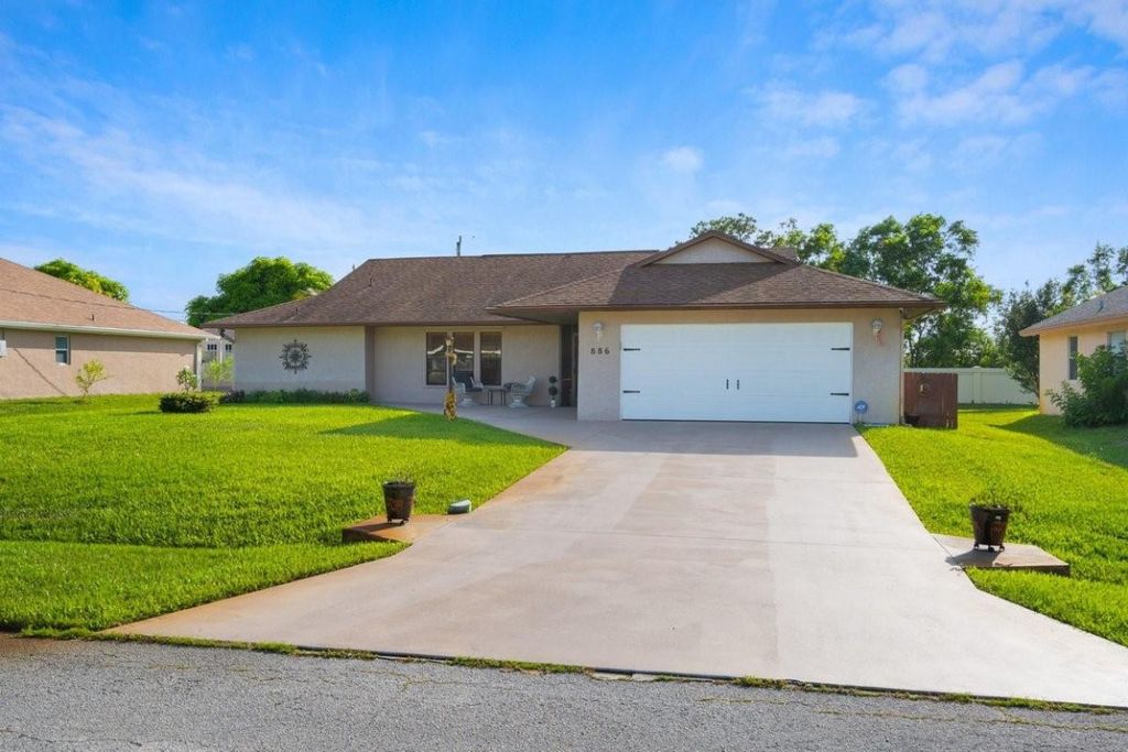 Photo of 886 SE Odonnell Lane, Port Saint Lucie, FL 34983 (MLS # F10508269)