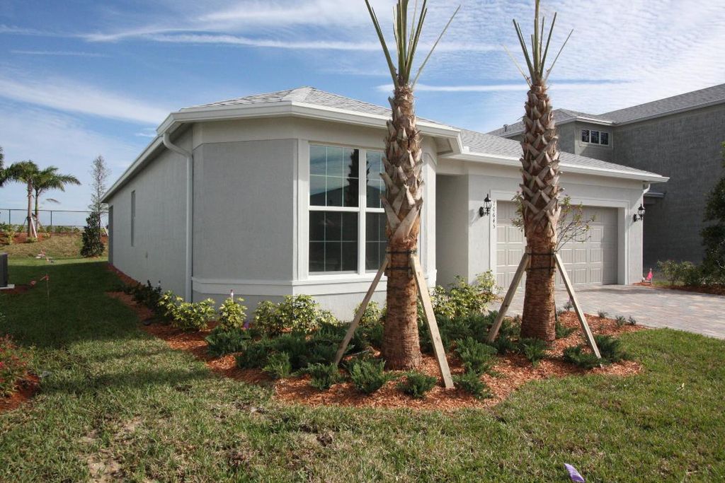 Photo of 10645 SW Morning Glory Drive, Port Saint Lucie, FL 34987 (MLS # R10952656)
