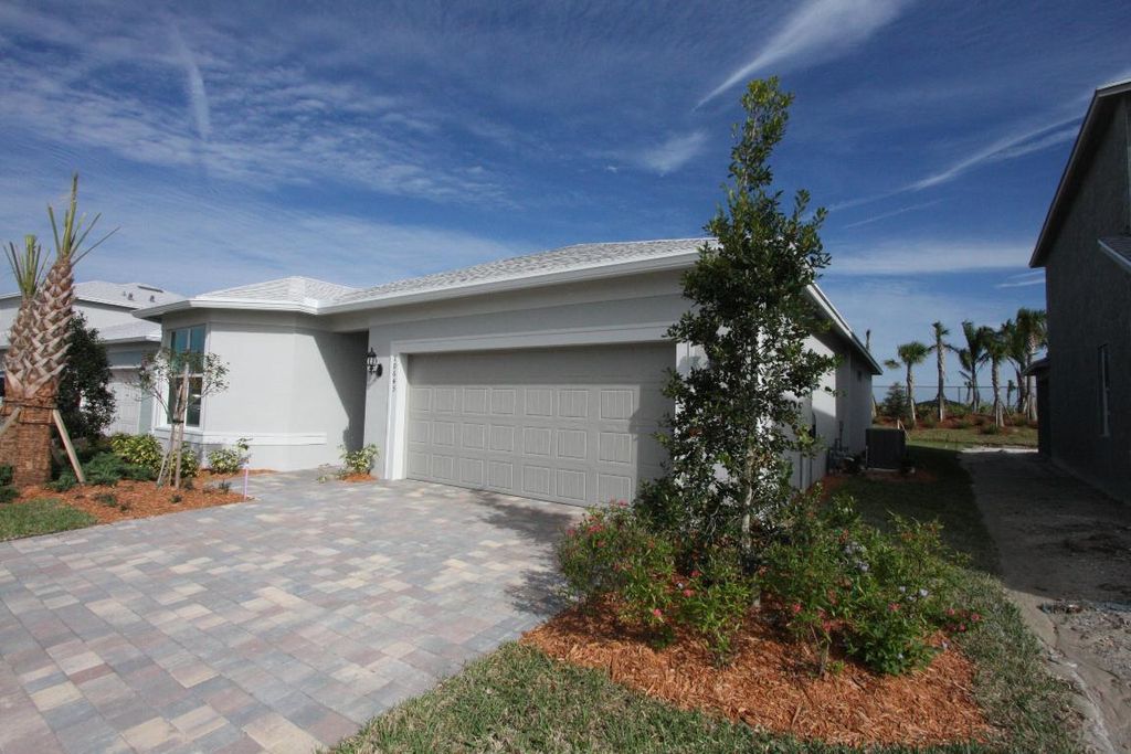 Photo of 10645 SW Morning Glory Drive, Port Saint Lucie, FL 34987 (MLS # R10952656)