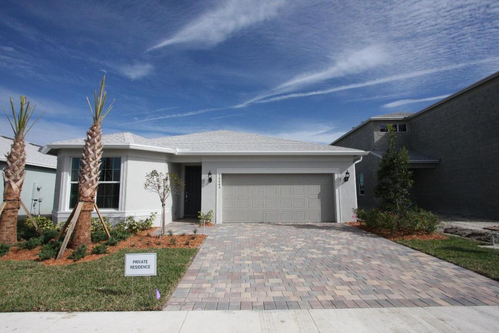 Photo of 10645 SW Morning Glory Drive, Port Saint Lucie, FL 34987 (MLS # R10952656)