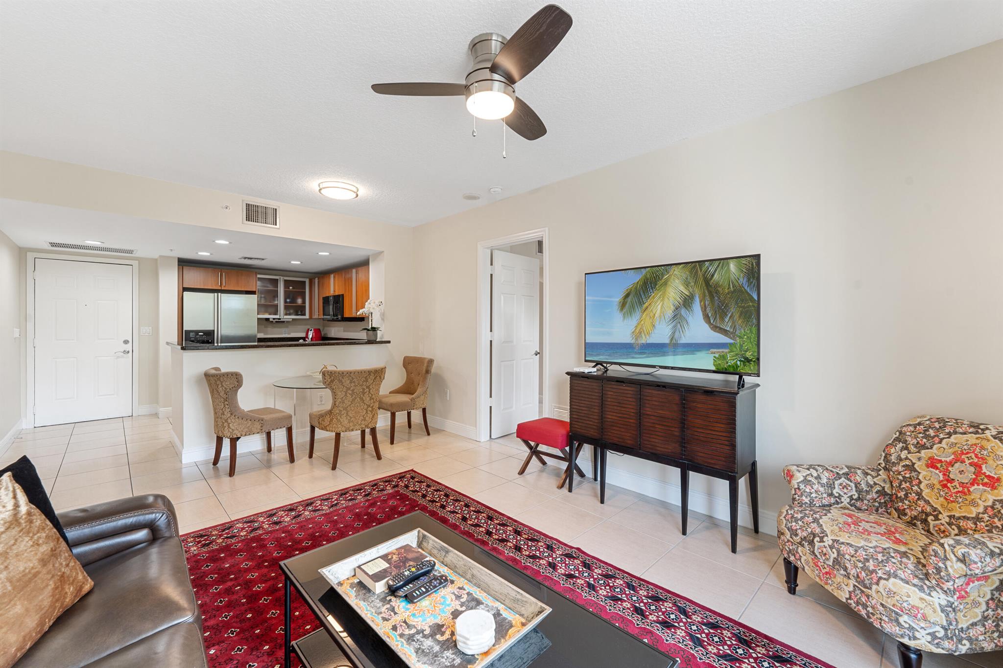 Freshly updated 2BD/2BA condo in the heart of Downtown West Palm Beach! This bright, move-in-ready unit features fresh paint, updated fans and light fixtures, new plush carpet in the bedrooms, and a stunning white-marble shower in the primary suite. The split-bedroom layout offers privacy, with a walk-in closet in the primary and double closets in the spacious second bedroom. Enjoy extended vanities, hurricane impact glass, and a private balcony with a peaceful view. 610 Clematis offers resort-style amenities: 24/7 concierge and security, gated garage parking, infinity pool, spa, fitness center, sauna and steam room, outdoor grills, on site management and resident library. Walk to Publix, Brightline Train Station, The Square, Clematis Street, and the waterfront! Welcome to Florida Living!