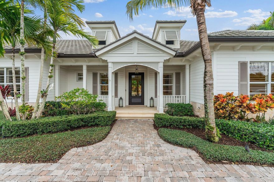 Living the Coastal Dream in the heart of PBG! No detail was spared on this CUSTOM BUILDER'S OWN HOME! Beyond the unparalleled attention to detail, this highly efficient home offers 4 bedrooms, 3.5 baths along with an office/ den & spacious 3-car garage. Inside this well-appointed home enjoy subtle and beautiful architectural touches throughout, an impressive chef's kitchen boasting commercial appliances, marble countertops, remarkable storage and high-end cabinetry. The icynene-insulated attic is a stand up height 8x20 shelved storage room that maintains cool temperatures. This home's impressive features are extensive; see documents for a complete list.This dreamy home is located steps away from the Intracoastal and comes with exclusive access to a day dock. LOW HOA & Incredible location!