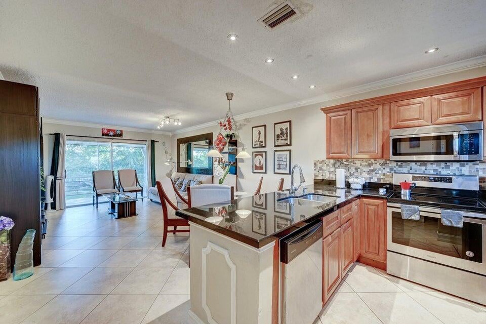 Photo of 5102 NW 36th Street #604, Lauderdale Lakes, FL 33319 (MLS # R11101479)
