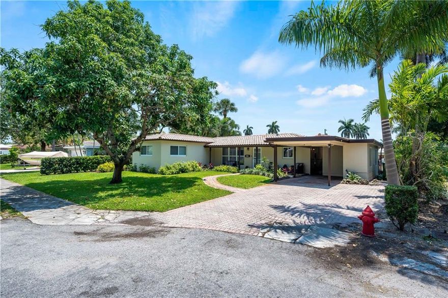 SECOND FROM THE POINT OF THE NEW RIVER, 75’ OF WATERFRONT, RIVER VIEW, DEEP WATER, NO FIXED BRIDGES, AND UNRESTRICTED OCEAN ACCESS. The home features a bright open floor plan with a river view from the Florida room. Move-in ready with high-impact windows throughout.  The outdoor area is excellent for year-round entertaining with a heated pool and lovely patio. Perfect location!  Just minutes from downtown, high-end shops and restaurants on Las Olas, I95, I595, the airport, and award-winning beaches.