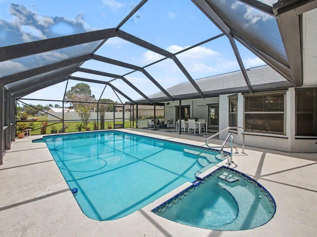 Photo of 1549 SE Pitcher Road, Port Saint Lucie, FL 34952 (MLS # B26019532)