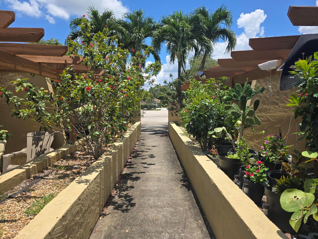 Photo of 1155 White Pine Pine #1155, Wellington, FL 33414 (MLS # B26042055)