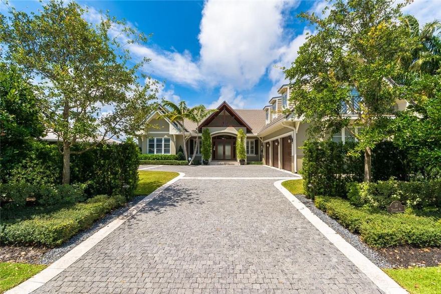 Gorgeous Intercoastal waterfront home in exclusive Sea Ranch Lakes. This Architect designed home built 2015/2016 boasts volume ceilings, 5 bdrm 5.5 Bath, 3 car garage and a 1,440 SF temperature controlled attic. Features 2 30" sub zero wine coolers, 96' dock, whole house generator, water filtration system and standup spa. Custom designed audiophile and AV system. Gated community and members only beach club. Watch luxury yachts go by on the large covered patio. Water and power on dock for future boat lift.