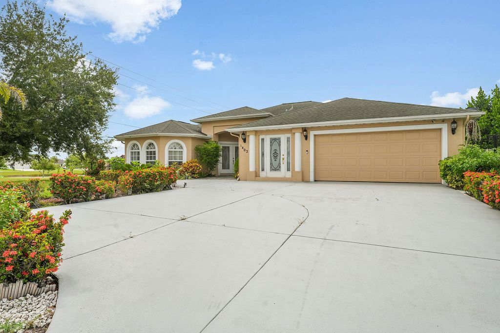 Photo of 1402 SW Doe Court, Port Saint Lucie, FL 34953 (MLS # R11160861)