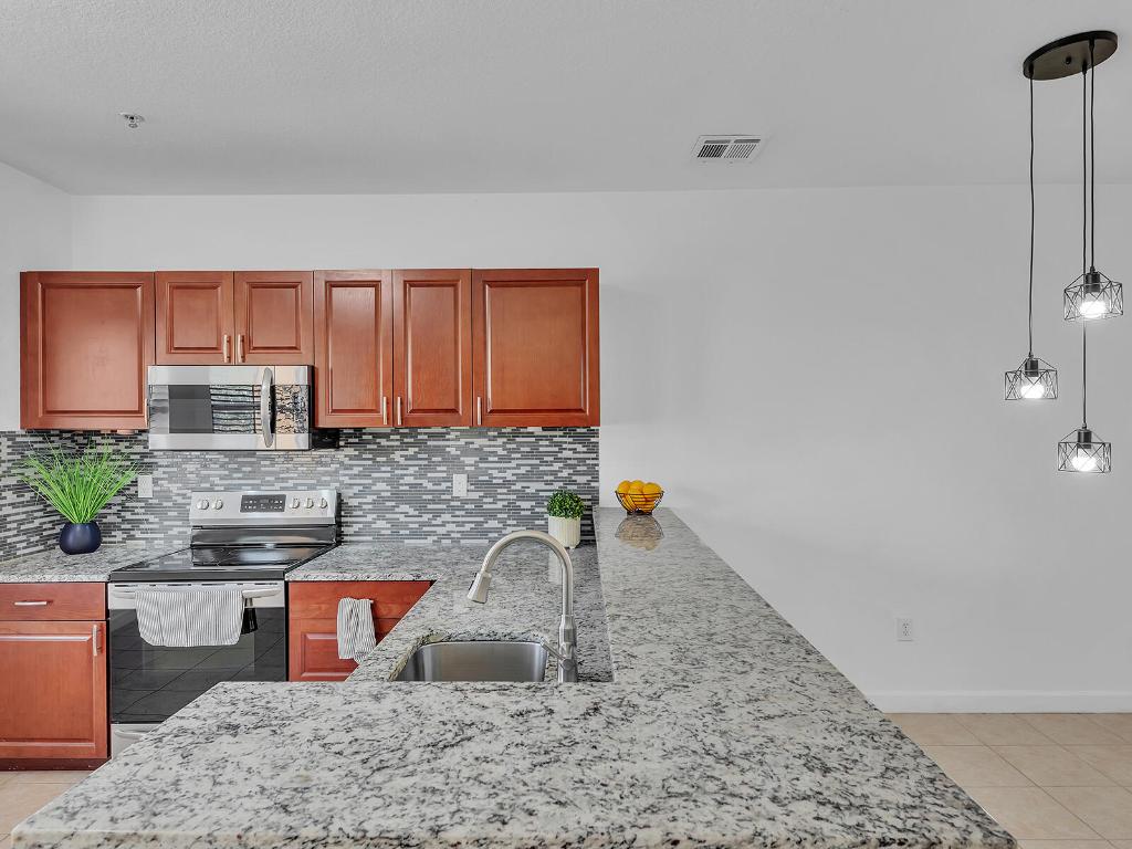 SHOMA TOWNHOMES AT ROYAL PALM BEACH CONDOMINIUM - Residential