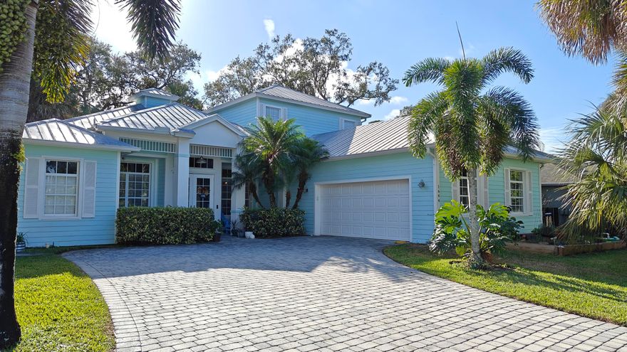 Welcome to this stunning two-story Key West-style home, offering the perfect blend of charm, comfort, and modern upgrades. This spacious residence features 4 bedrooms, 3.5 bathrooms, and a 2-car garage, all set on a beautifully maintained property with numerous desirable amenities.

Inside, the bright and airy great room flows seamlessly across porcelain tile flooring. The updated 2019 kitchen impresses with granite countertops, stainless steel appliances, and plenty of storage—perfect for everyday living and entertaining. French doors open to the outdoor living space, enhancing the home's natural light and coastal feel.

Step outside to your own private oasis: a covered patio overlooking a screened-in pool and spa, complete with an outdoor shower and private pool area designed for relaxation. The paved driveway adds to the home's curb appeal, while the front porch enhances its Key West charm.

Additional features include:
" 2nd-floor impact windows and storm panels on the 1st floor
" Sewer and city water connection
" Sprinkler system operating on well water
" Alarm system for added security

The second-floor loft offers a versatile bonus area with a full bathroom and walk-in closet, ideal as a guest suite, office, or playroom.

This home combines coastal style with modern conveniencetruly move-in ready and designed for the Florida lifestyle.

Close to shopping, dining, I95 and Oak Hammock Park (C-24 Canal).