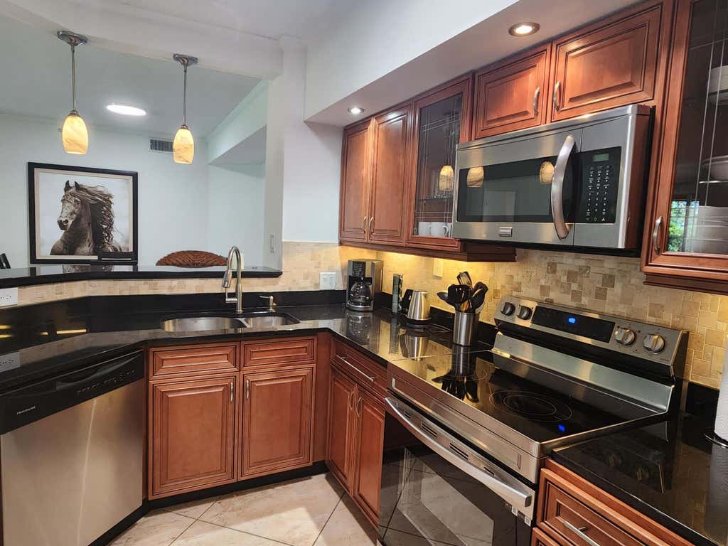 Photo of 11790 Saint Andrews Place #205, Wellington, FL 33414 (MLS # B26050052)