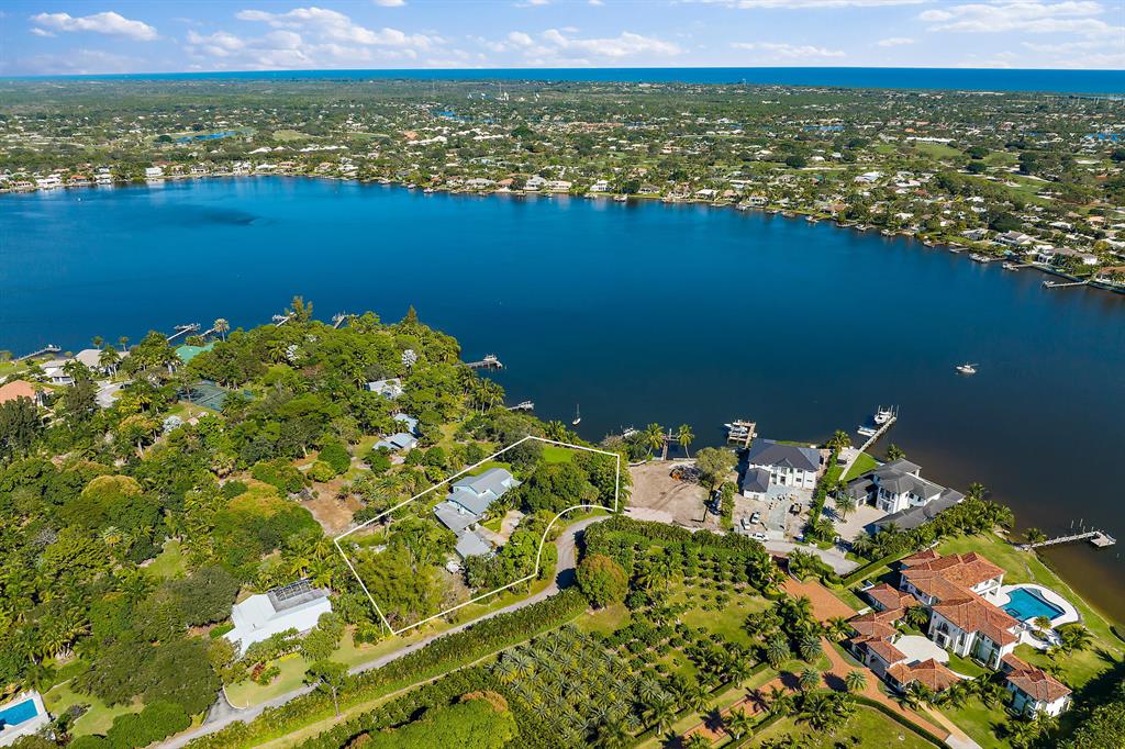 Build your custom estate on this spectacular 1.29 acre property located directly on the Loxahatchee River with approx. 120' of river frontage. Bamboo Lane is easily accessed off of Loxahatchee River Rd and is lined with all new custom waterfront homes. This property is the last and largest site left to be developed for the waterfront homes on Bamboo Lane. This breathtaking property is conveniently located only minutes to the Jupiter Inlet and is ideal for the avid boater! This listing also includes the lot behind it which makes this lots 1.29 acres. The seller requires at minimum 90 days post occupancy.