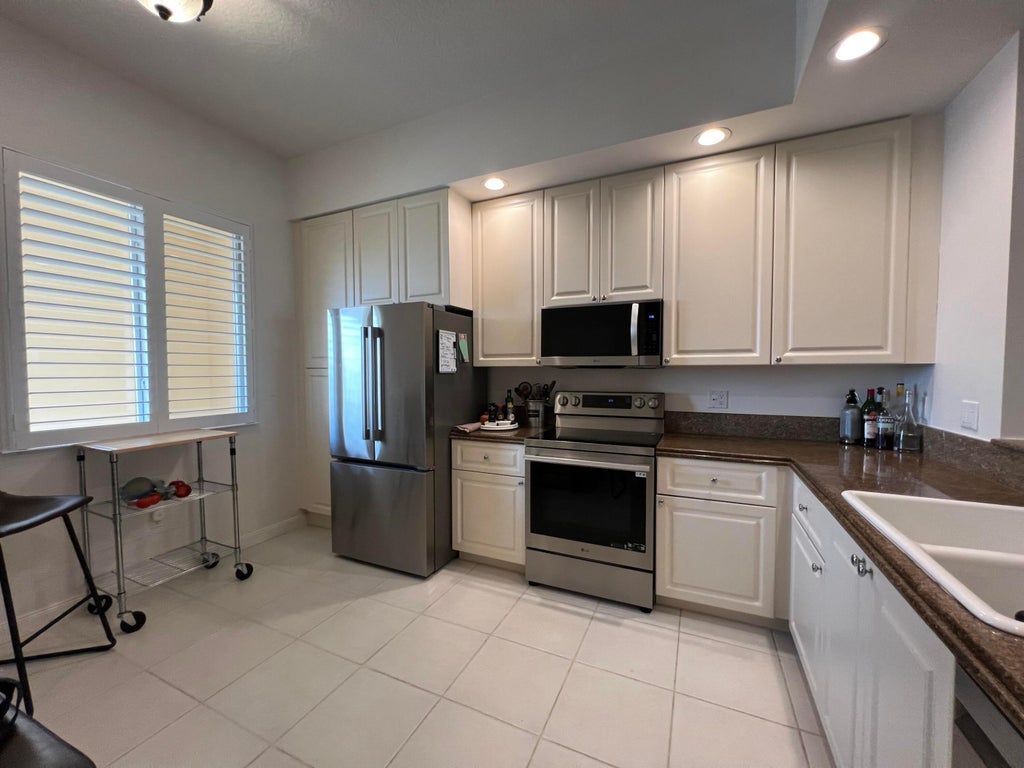Photo of 13 Harbour Isles Drive W #PH02, Fort Pierce, FL 34949 (MLS # B26055443)