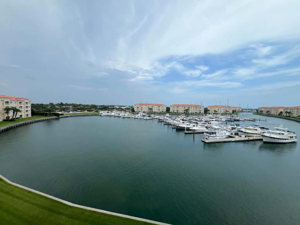 Photo of 13 Harbour Isles Drive W #PH02, Fort Pierce, FL 34949 (MLS # B26055443)