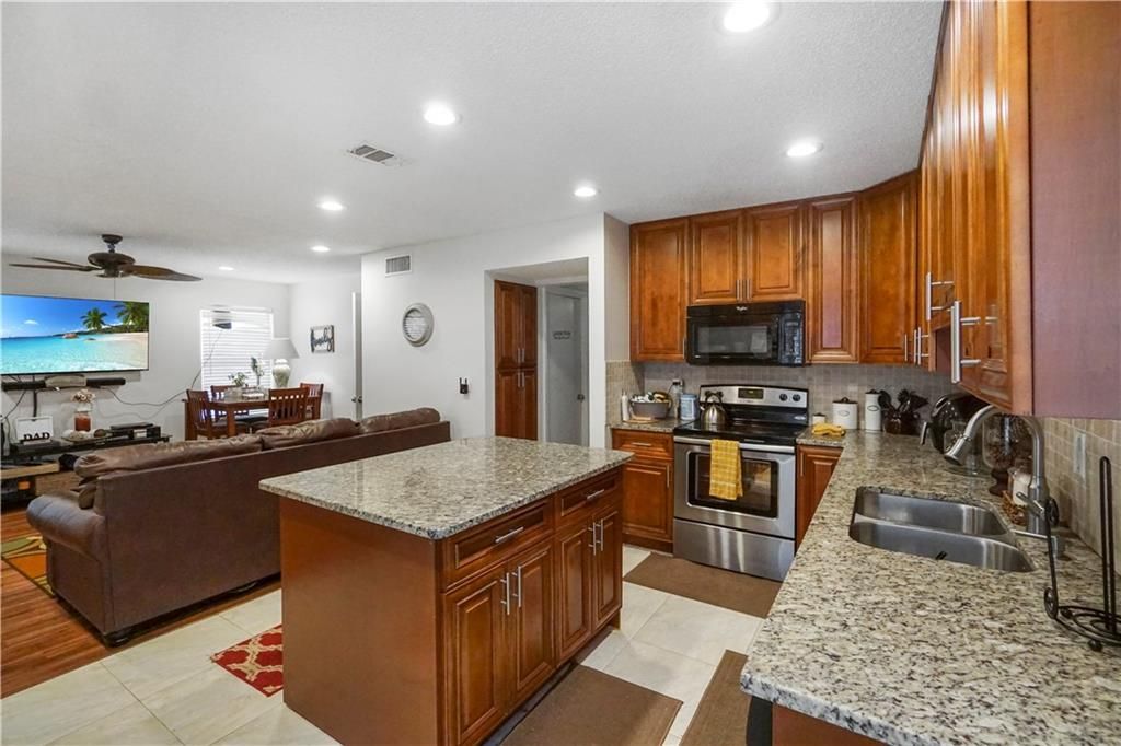 Photo of 5690 Dewberry Way, West Palm Beach, FL 33415 (MLS # F10325814)