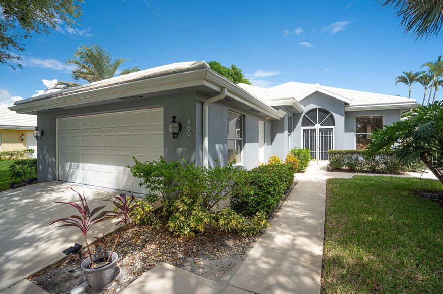 Stunning Views! Enjoy South Florida living in the sought-after gated community of Bear Island. This beautifully maintained single-story home sits on the golf course offering sweeping golf and lake views with beautiful sunrises. From the moment you enter, you're welcomed by an abundance of natural light, neutral tones, and spacious open-concept living and dining areas. Expansive Impact sliding doors seamlessly connect the indoor space to a serene backyard and patio, ideal for relaxing or entertaining against a stunning golf course backdrop. Live in one of Palm Beach's premier golf course communities without the burden of a mandatory membership fee. Bear Island is a 24-hour manned gated community, located within Village Lakes POA. This offers 3 separate parks with pools, tennis and more!
