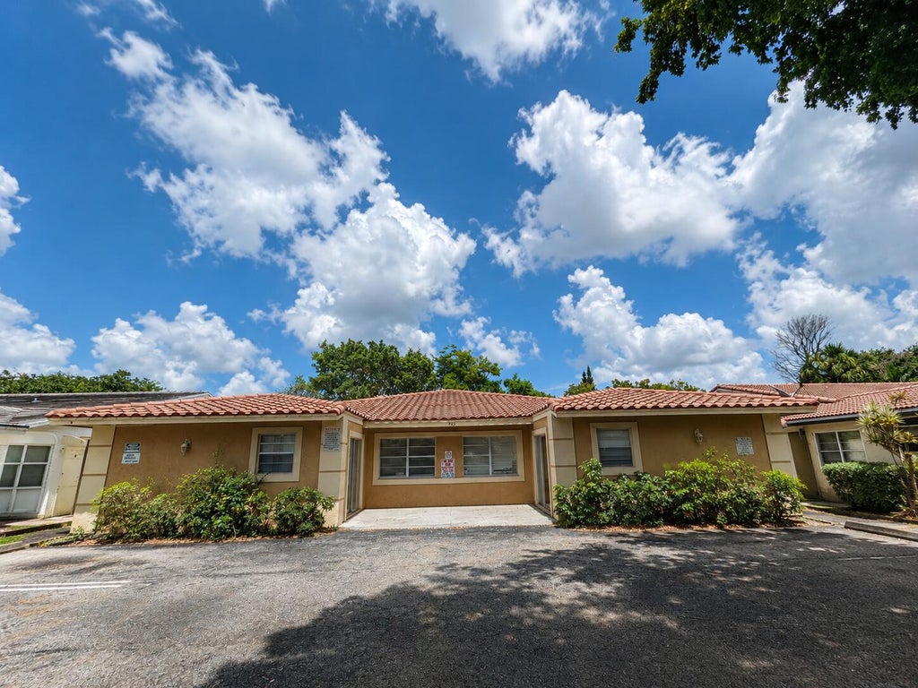 Photo of 4125 Woodside Drive #2, Coral Springs, FL 33065 (MLS # B26056574)