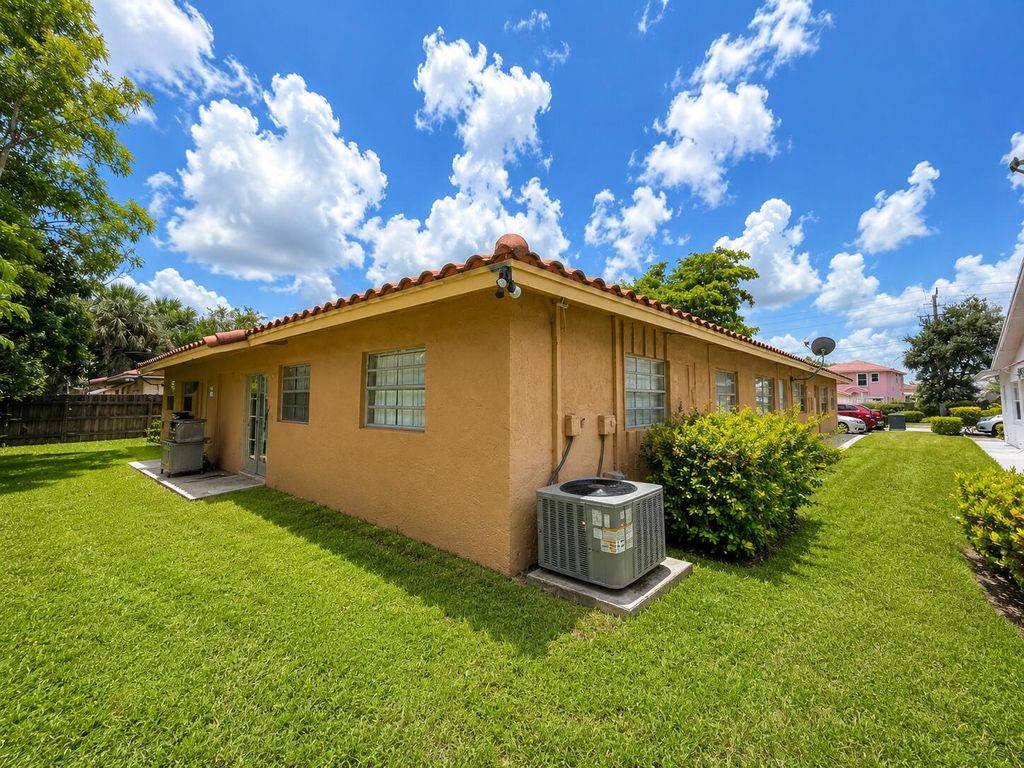 Photo of 4125 Woodside Drive #2, Coral Springs, FL 33065 (MLS # B26056574)