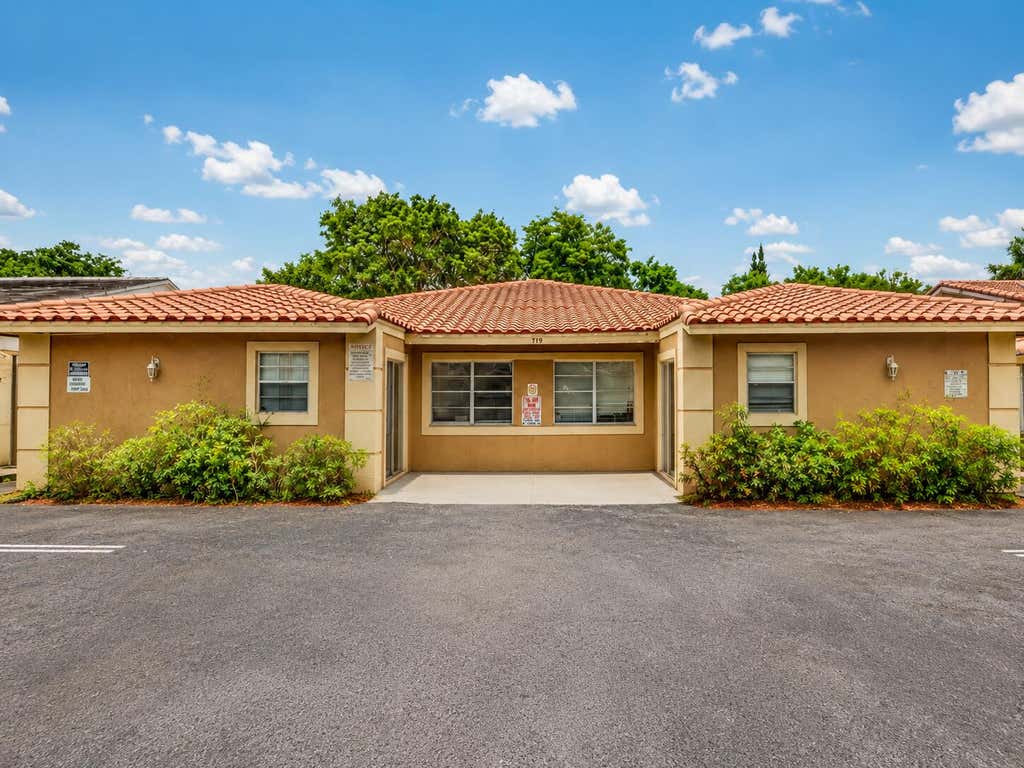 Photo of 4125 Woodside Drive #2, Coral Springs, FL 33065 (MLS # B26056574)