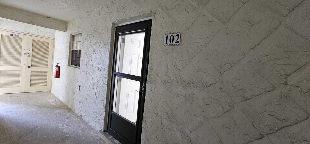 Photo of 12005 Poinciana Boulevard #102, Royal Palm Beach, FL 33411 (MLS # B26019146)